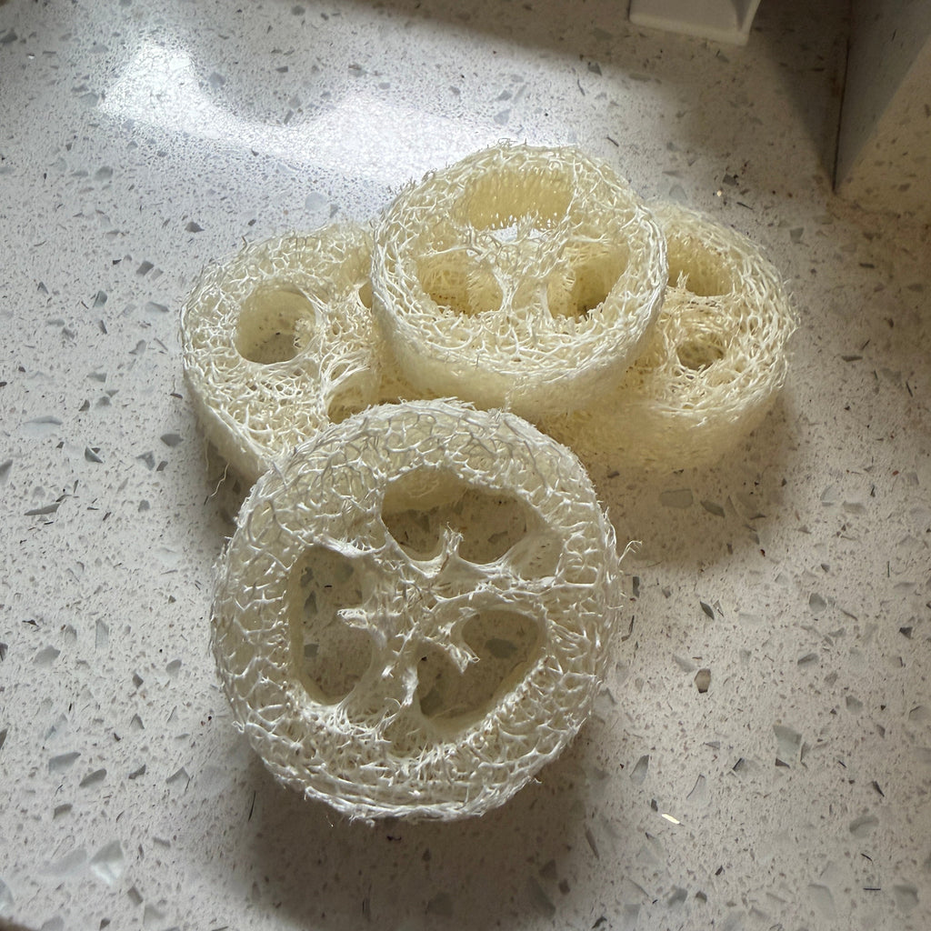 Pick & Match Gift Bag with three cream-coloured natural loofah soap rounds, each featuring an open textured mesh pattern