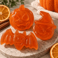 Pick & Match Gift Bag with three translucent orange soaps shaped as a pumpkin, witch hat and bat